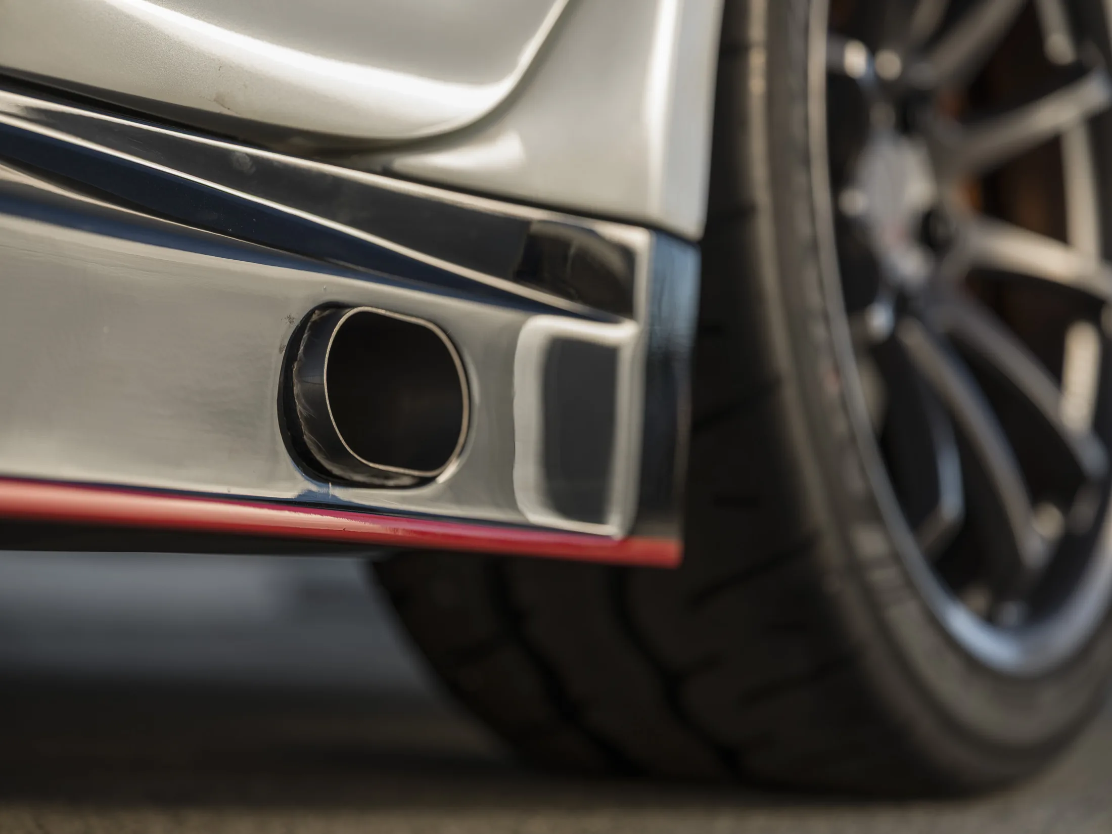 side-exit exhaust outlet beside the rear wheel.