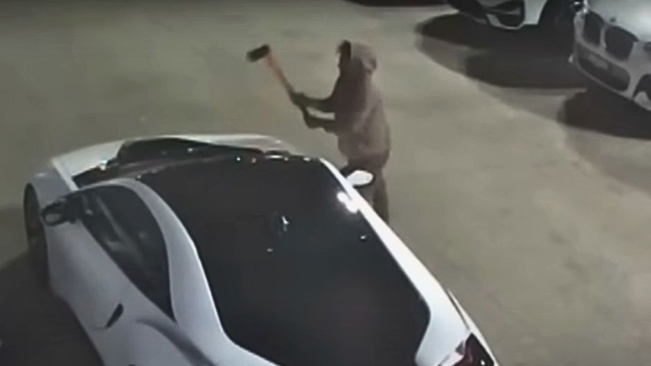 Melbourne man with axe damages car