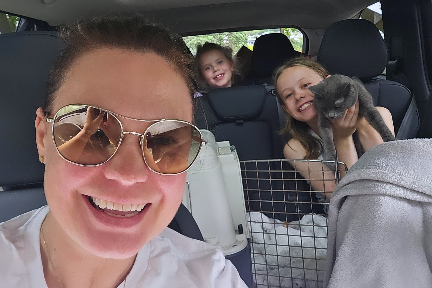 Kathryn Wilson with her daughters and cat in the Volvo XC90