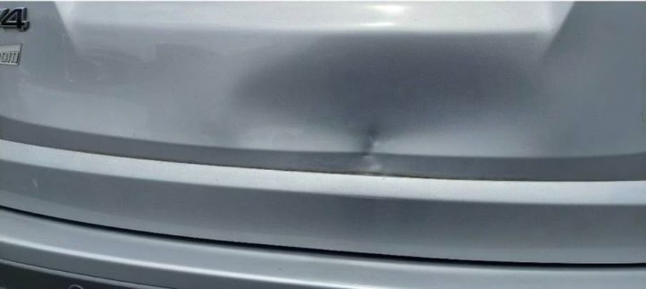 Auckland woman carpark crash